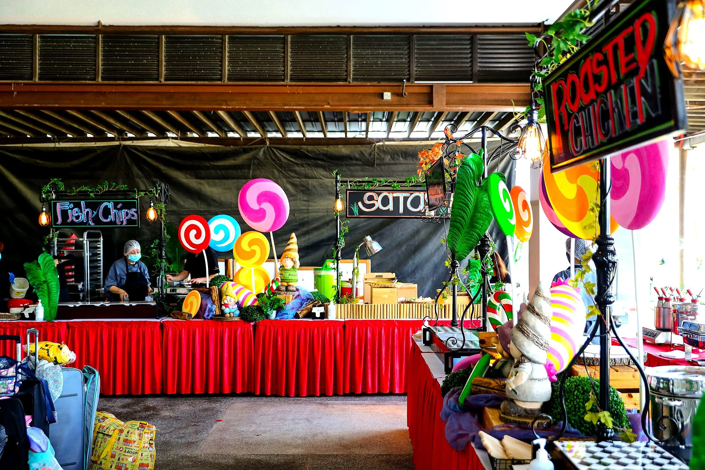 Colourful sweets and snack stall in a covered pavilion