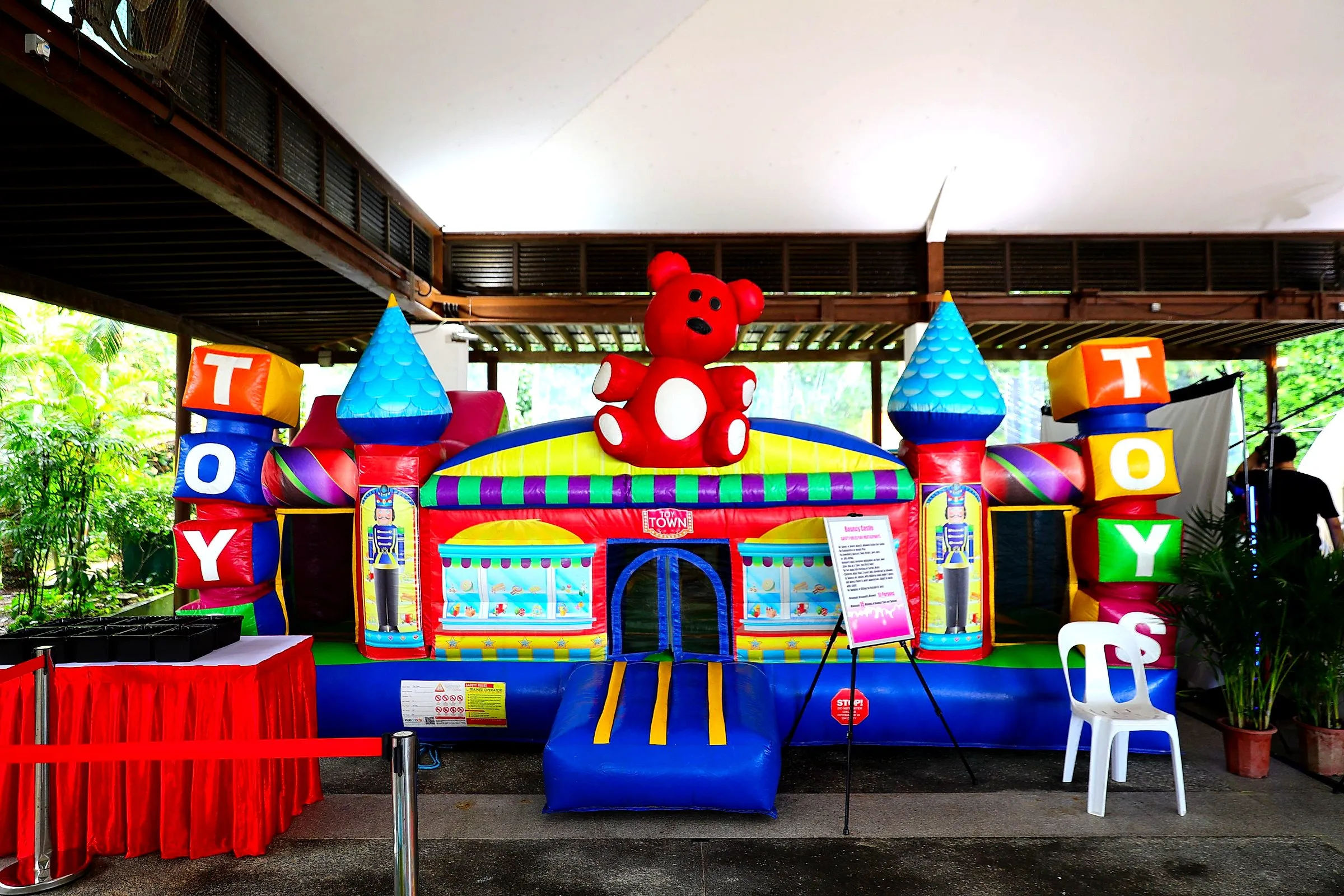 Colourful inflatable castle at an outdoor family day